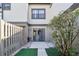 Backyard view featuring fenced in yard with patio and view into the home at 440 Woods Landing Trl, Oldsmar, FL 34677