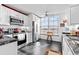Modern kitchen featuring stainless steel appliances and dark granite countertops at 4460 Fairways Blvd # 401, Bradenton, FL 34209