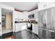 Bright kitchen featuring stainless steel appliances and dark countertops at 4460 Fairways Blvd # 401, Bradenton, FL 34209