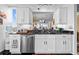 Bright kitchen featuring stainless steel appliances, dishwasher, and granite countertops at 4460 Fairways Blvd # 401, Bradenton, FL 34209