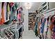 Spacious walk-in closet filled with clothing and shoes, offering ample storage at 4950 Bayshore Blvd # 14, Tampa, FL 33611