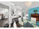 Open-concept kitchen and dining area with bar seating and modern decor at 4950 Bayshore Blvd # 14, Tampa, FL 33611