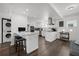 Modern kitchen with stainless steel appliances, white cabinetry, and a breakfast bar at 4950 Bayshore Blvd # 14, Tampa, FL 33611