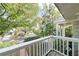Scenic view from the balcony, showcasing tree-lined streets and well-manicured landscaping at 5011 S Elberon St, Tampa, FL 33611