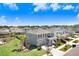 Suburban home in a quiet neighborhood, featuring manicured lawns and proximity to local amenities at 5407 Tagalong Pl, Apollo Beach, FL 33572