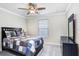 Bedroom with ceiling fan, window, and nice furniture at 5407 Tagalong Pl, Apollo Beach, FL 33572
