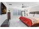 Bedroom features a large window with privacy blinds and comfortable furniture at 5407 Tagalong Pl, Apollo Beach, FL 33572