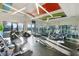 Community fitness center featuring modern exercise equipment with multiple treadmills, bikes and weight machines and ample natural light at 5407 Tagalong Pl, Apollo Beach, FL 33572