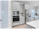 Modern kitchen showcasing stainless steel appliances and contemporary cabinetry with plenty of storage space at 5407 Tagalong Pl, Apollo Beach, FL 33572