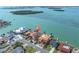Aerial shot of waterfront homes, showing the property's prime location with easy access to the open bay at 700 126Th Ave, Treasure Island, FL 33706