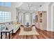 Cozy living room area with neutral tones, wood flooring, and stylish furnishings at 700 126Th Ave, Treasure Island, FL 33706