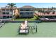 Waterfront home with private dock and boat lift offers serene outdoor living at 700 126Th Ave, Treasure Island, FL 33706
