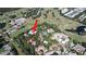 A scenic aerial view of community homes near golf course and pool at 700 Starkey Rd # 821, Largo, FL 33771