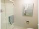 Bright bathroom with a glass-enclosed shower and modern toilet at 700 Starkey Rd # 821, Largo, FL 33771