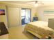 Bright bedroom with balcony access and a ceiling fan, perfect for relaxing at 700 Starkey Rd # 821, Largo, FL 33771