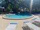 Cool off in the community pool with plenty of lounge chairs and seating nearby at 700 Starkey Rd # 821, Largo, FL 33771