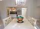 Spacious dining area featuring a well-appointed bar and stylish light fixture at 700 Starkey Rd # 821, Largo, FL 33771