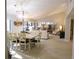Spacious dining and living room area with neutral tones and vaulted ceiling at 700 Starkey Rd # 821, Largo, FL 33771