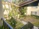 Exterior view of the complex featuring a courtyard area at 700 Starkey Rd # 821, Largo, FL 33771