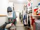 Spacious walk-in closet with shelves and hanging rods for organization at 700 Starkey Rd # 821, Largo, FL 33771