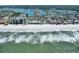 Aerial real estate image showcasing coastline properties near the ocean, with nearby streets and a charming beach community at 812 Gulf # 3, Indian Rocks Beach, FL 33785