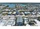 A stunning aerial view of homes in a beachfront community, near both the ocean and a tranquil lake at 812 Gulf # 3, Indian Rocks Beach, FL 33785