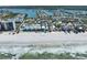 Stunning aerial view of coastal property featuring beachfront homes, sandy beaches and beautiful ocean front landscapes at 812 Gulf # 3, Indian Rocks Beach, FL 33785