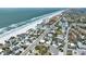 Expansive aerial view of beachfront property featuring ocean views, coastal homes and sandy shorelines at 812 Gulf # 3, Indian Rocks Beach, FL 33785