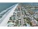 Aerial real estate image showcasing coastline properties near the ocean, with nearby streets and a charming beach community at 812 Gulf # 3, Indian Rocks Beach, FL 33785