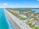 Stunning aerial view of a beachfront property, showcasing its prime location and picturesque surroundings at 812 Gulf # 3, Indian Rocks Beach, FL 33785