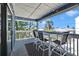 Enjoy the views from this charming balcony with a bar-height table and string lights at 812 Gulf # 3, Indian Rocks Beach, FL 33785