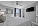 Calm bedroom with bedside table and decor along with television and outside view at 812 Gulf # 3, Indian Rocks Beach, FL 33785