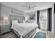 Serene bedroom featuring a comfortable bed, stylish nightstands, and a soothing color scheme at 812 Gulf # 3, Indian Rocks Beach, FL 33785