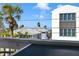 Charming exterior view featuring palm trees and well-maintained architecture at 812 Gulf # 3, Indian Rocks Beach, FL 33785