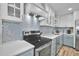 Bright kitchen with stainless steel appliances, sleek countertops, and modern cabinetry at 812 Gulf # 3, Indian Rocks Beach, FL 33785