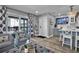 Cozy living room with a sliding glass door to a balcony, complemented by stylish decor at 812 Gulf # 3, Indian Rocks Beach, FL 33785