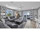 Relaxing living room with balcony access, well-appointed furniture, and coastal decor at 812 Gulf # 3, Indian Rocks Beach, FL 33785