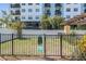 Fenced dog park in a condo community offers a dedicated space for pets to play at 107 S Obrien St # 117, Tampa, FL 33609