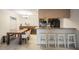 The kitchen offers modern appliances, bar seating, dining area and ample storage at 107 S Obrien St # 117, Tampa, FL 33609