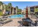 Inviting community pool area with lounge chairs and tables, perfect for relaxing and socializing at 107 S Obrien St # 117, Tampa, FL 33609