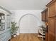 Bright office space featuring custom cabinets and a unique arched doorway for added character at 108 24Th St, Belleair Beach, FL 33786