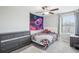 Bright bedroom featuring neutral walls, ceiling fan and window at 11218 Sage Canyon Dr, Riverview, FL 33578