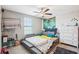 Spacious bedroom featuring neutral walls, ceiling fan and window at 11218 Sage Canyon Dr, Riverview, FL 33578