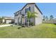 Stunning property showcasing lush green grass and mature landscaping enhancing the home's curb appeal at 11218 Sage Canyon Dr, Riverview, FL 33578