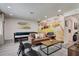 Spacious game room featuring a pool table, beachy vibes wall art, and comfortable seating at 12299 91St N Ave, Seminole, FL 33772