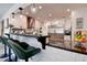 Bright kitchen with granite countertops, stainless steel appliances, and breakfast bar seating at 12299 91St N Ave, Seminole, FL 33772