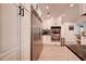Well-lit kitchen featuring modern appliances, ample cabinetry, and light wood flooring at 12299 91St N Ave, Seminole, FL 33772
