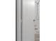 A white shower head and faucets with clear handles attached to white tile at 12720 Four Oaks Rd, Tampa, FL 33624