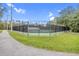 Community tennis court and walking path at 16843 Harrierridge Pl, Lithia, FL 33547