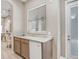 Wet bar with countertop space, small refrigerator, and wood cabinets at 16843 Harrierridge Pl, Lithia, FL 33547